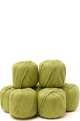 the green yarn skeins isolated on white