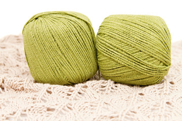 the green yarn skeins isolated on white