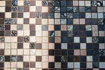 Partly sunlit and dark ceramic tile of different color