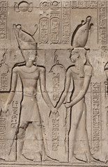 Hieroglyphic carvings on an Egyptian temple wall