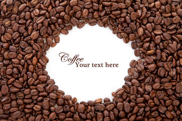 Coffee beans over white with text space