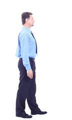 Full length profile of a middle aged business man