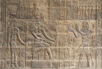 Hieroglyphic carvings on an Egyptian temple wall