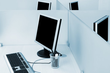 Fototapeta na wymiar computers on a desk