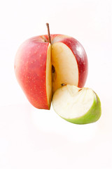 Combination of red apple with green apple slice