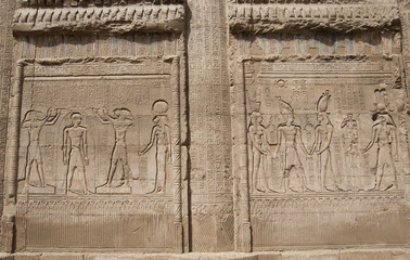 Hieroglyphic carvings on an Egyptian temple wall