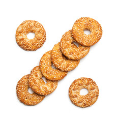 sesame cakes on white background. the form of percent