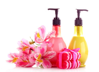 Cosmetic cream and lily isolated on white background