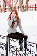 woman is in winter in a park