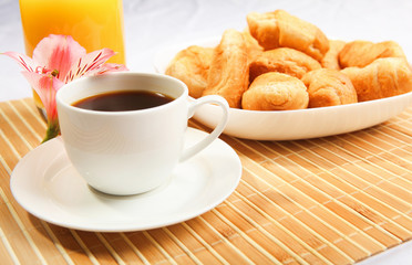 Breakfast coffee and croissants