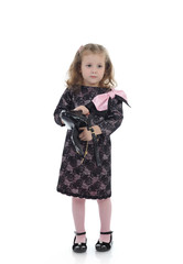 Pretty little child girl in black elegant party dress with empty