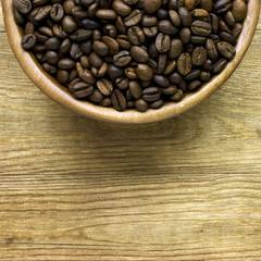 Fototapeta premium coffee beans on wood bowl
