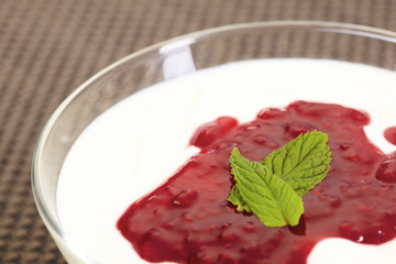 Raspberry jam on yoghurt