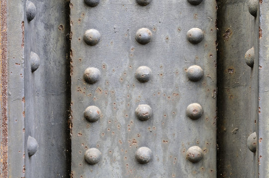 Old steel plate with rivets