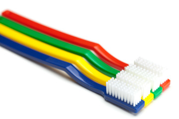 colored toothbrush isolated on white