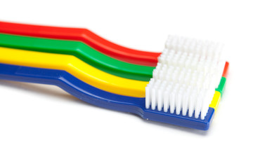 colored toothbrush isolated on white
