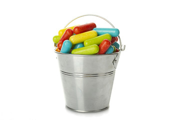 Fototapeta na wymiar Colored candy in the bucket