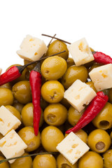 Olives and chili pepper and shards sheep cheese