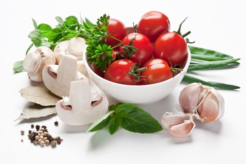 Group of fresh vegetables and tomatoes.
