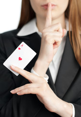 ace of hearts on woman hand