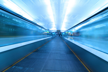 Moving escalator in airport