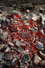 Hot coals in a grill. Closeup