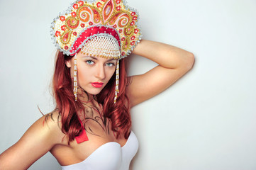 Closeup portrait of pretty young woman with red hairs