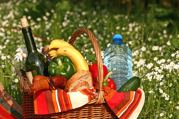 basket of picnic on the grass