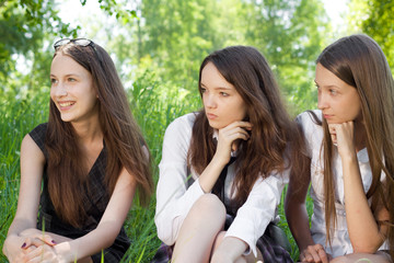 three beautiful smile student girl in the park