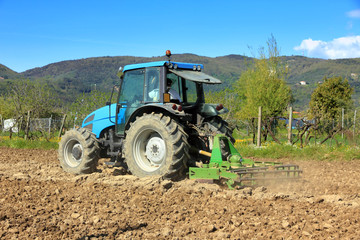Obraz premium Agriculture, farming tractor