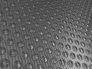 Carbon fibre surface with round buttons
