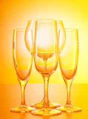 Wine glasses against gradient background