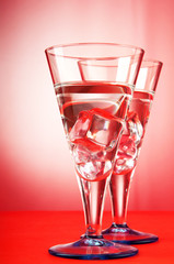 Water in the glass against gradient background