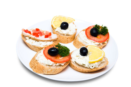 mini candwiches on white plate