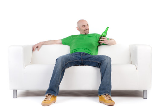 Man On Sofa Holding Beer