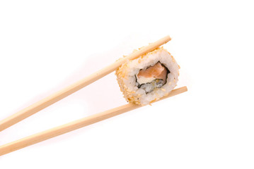Sushi with chopsticks isolated on a white background