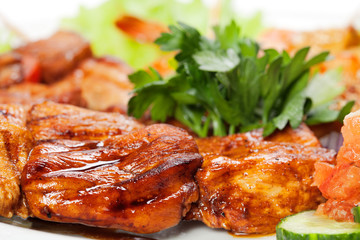 barbecue with sauce and vegetables