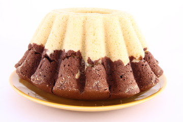 Bundt Cake, freshly baked, on white background