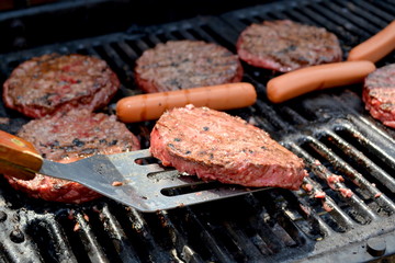 Flipping a Grilling Burger