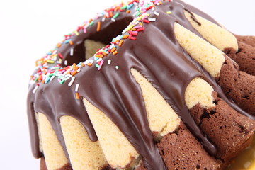 Bundt Cake, covered with chocolate and sprinkles