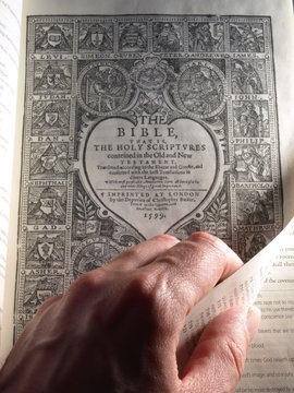 Turning The Title Page Of The Geneva Bible