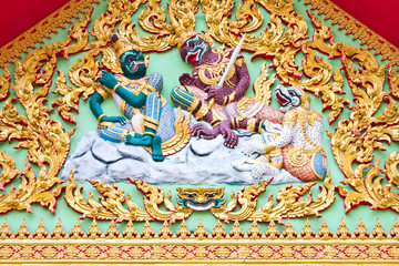 Art Ramayana story stucco church in front of the temple Thailand