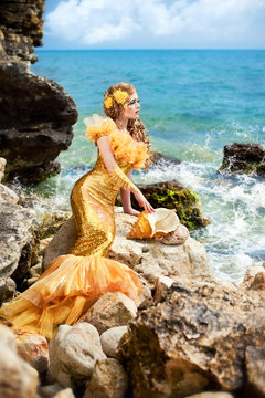Young beautiful girl in the image of a mermaid