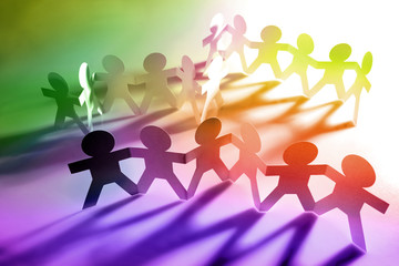 Colorful group of people together in unity holding hands for support