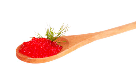 Red caviar on spoon isolated on white