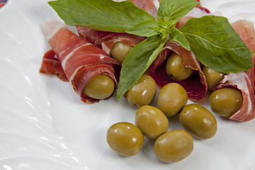 Smoked ham with olives