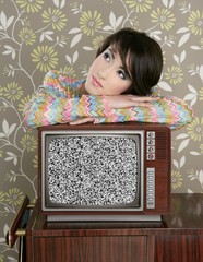 retro pensive woman on vintage wooden tv 60s