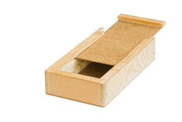 Empty wooden box with half opened lid on a white background.