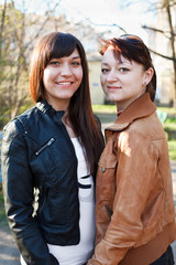 Fototapeta premium Beautiful happy smiling women standing together.