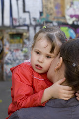 Mom and daughter hug